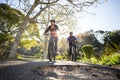 Biker couple cycling on the countryside road Royalty Free Stock Photo