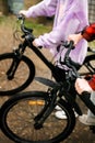 Biker couple riding mountain bicycle in the forest at countryside Royalty Free Stock Photo