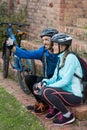 Biker couple taking selfie from mobile phone Royalty Free Stock Photo