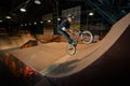 Biker doing bar spin trick