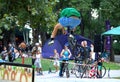 Biker doing stunts in city park