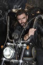 Fashion portrait of young handsome and biker man