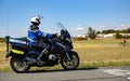 biker of the French gendarmerie on a country road in escort during the tour de france cyclist Royalty Free Stock Photo