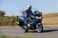 biker of the French gendarmerie on a country road in escort during the tour de france cyclist