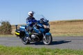 Biker of the French gendarmerie on a country road in escort during the tour de france cyclist