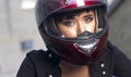 Biker Girl Looks at Camera Red Full Face Helmet Royalty Free Stock Photo