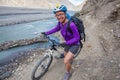 Biker-girl in Himalaya mountains Royalty Free Stock Photo