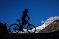 Biker-girl in Himalaya mountains Royalty Free Stock Photo