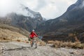 Biker girl in Himalaya mountains, Anapurna region Royalty Free Stock Photo
