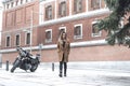 Biker girl in a leather jacket on a motorcycle Royalty Free Stock Photo