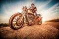 Biker girl on a motorcycle Royalty Free Stock Photo