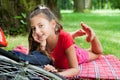 Biker girl relaxing in the park Royalty Free Stock Photo