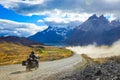 Biker on the Long Beautiful Road to the Mountains in the Torres Del Paine National Park, Chile Royalty Free Stock Photo