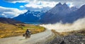 Biker on the Long Beautiful Road to the Mountains in the Torres Del Paine National Park, Chile