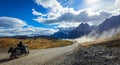 Biker on the Long Beautiful Road to the Mountains in the Torres Del Paine National Park, Chile