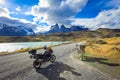 Biker on the Long Beautiful Road to the Mountains in the Torres Del Paine National Park, Chile