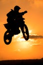 A biker makes a big jump