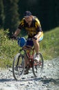 Biker on mountain road Royalty Free Stock Photo