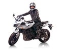 Biker rides white motorcycle Royalty Free Stock Photo