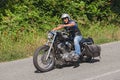 Biker riding Harley-Davidson Sportster