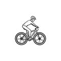 Biker riding mountain bike hand drawn outline doodle icon.