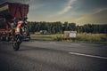 Biker riding an Yamaha R1 on the back wheel on the road