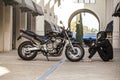 Biker sitting near sport motorcycle in helmet Royalty Free Stock Photo