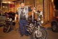 A biker stood next to his bike, Mississippi Royalty Free Stock Photo