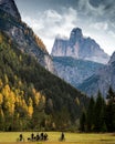 Bikers bicycling on a trail at the dolomites in the Italian Alps in Italy