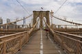 Brooklyn Bridge and bikers in New York City, USA Royalty Free Stock Photo