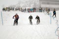 Bikers at extreme winter mountain bike downhill race Royalty Free Stock Photo