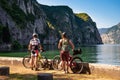 Bikers on Lake Iseo bike path, Lombardy, Italy. Oglio bicycle route