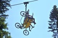 Bikers on a mountain lift.