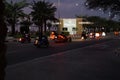 Bikers ride at night on the highway on Al-Marjan Island. United Arab Emirates Royalty Free Stock Photo