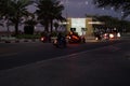 Bikers ride at night on the highway on Al-Marjan Island. United Arab Emirates Royalty Free Stock Photo