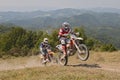 Bikers riding enduro motorcycles KTM 510 and KTM EXC 250