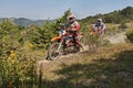 Bikers riding enduro motorcycles KTM 690 Enduro R and KTM EXC 450