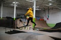 Bikers and skaters are practicing their tricks inside Royalty Free Stock Photo