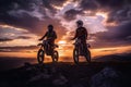 Bikers with their motocross bikes looking at atardecer