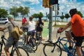 Bikers Wait at a road crossing in Madison, WI Royalty Free Stock Photo