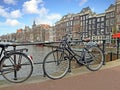 Bikes on the bridge along the canal in Amsterdam the Netherlands Royalty Free Stock Photo