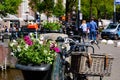 Bikes on the bridge that crosses the canal in Amsterdam Royalty Free Stock Photo