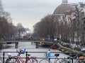 Bikes on canal bridge, Amsterdam Royalty Free Stock Photo
