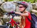 Bikes cycling girl into park. Royalty Free Stock Photo