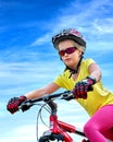 Bikes cycling girl wearing helmet rides bicycle. Royalty Free Stock Photo