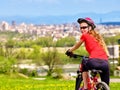 Bikes cycling girl wearing helmet. Royalty Free Stock Photo