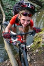 Bikes girl cycling fording throught water . Royalty Free Stock Photo