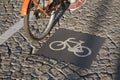 Bikes Lane Symbol and Cyclist, Amsterdam Royalty Free Stock Photo