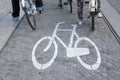 Bikes Lane Symbol and Cyclists, Amsterdam Royalty Free Stock Photo