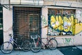 Bikes leaning on a graffiti wall in the Lower East Side of Manhattan.